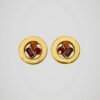 Boucles d'oreilles clips dorées Guy Laroche vintage, vue de face.