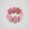 bracelet-manchette-elastique-rose-retro-cote Bracelet manchette élastique rétro à perles roses pastel, vue de côté.