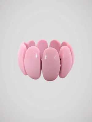 Bracelet manchette élastique rétro à perles roses pastel, vue de face.