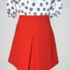 Zoom sur la jupe trapèze rétro style années 60-70, rouge orangé, pour femme, taille M, vue de face.