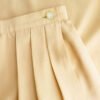 Zoom sur la jupe tailleur portefeuille jaune citron vintage des années 50, faite main, pour femme, taille XS à S.