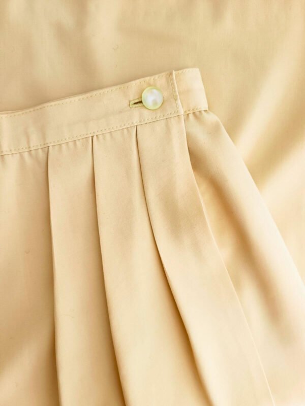 Zoom sur la jupe tailleur portefeuille jaune citron vintage des années 50, faite main, pour femme, taille XS à S.