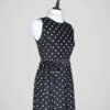 Robe noire à pois blancs style rétro, griffée Ralph Lauren, pour femme, taille S à M, vue de côté.